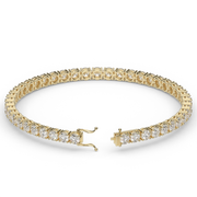 8 Carat Yellow Gold Round Shape Diamond Tennis Bracelet With Prong Setting.